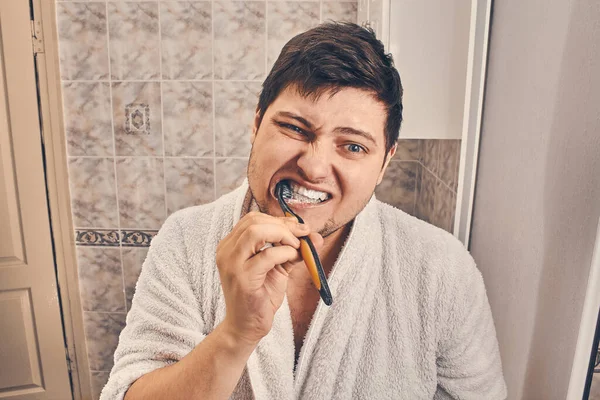 Man White Coat Brushing His Teeth Bathroom — Stock Photo, Image