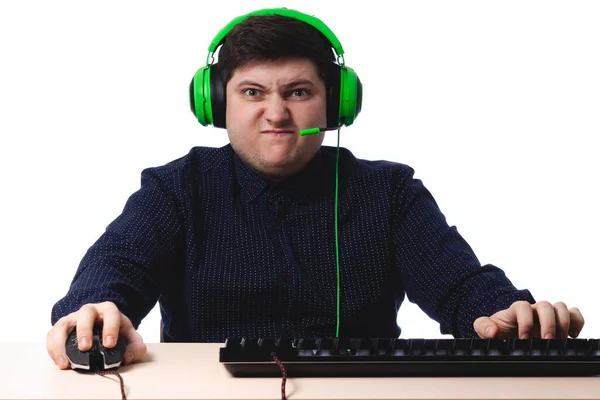 Young Guy Dark Blue Shirt Green Headphones Gamer Angry White — Stock Photo, Image