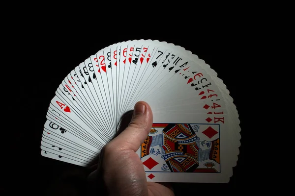 Hand Hold Fan Deck Poker Cards Black Background Copy Space — Stok Foto