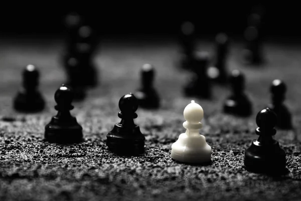 Row Black Pawns One White Pawn His Own Strangers Black — Stock Photo, Image