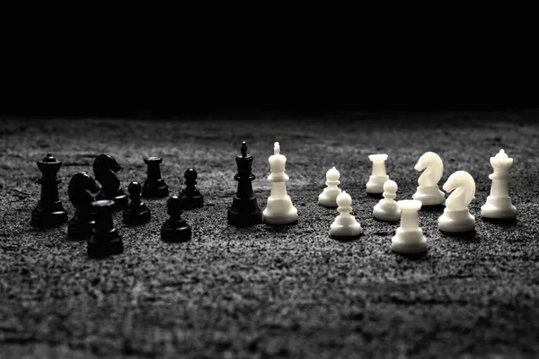 Chess Pieces Confrontation Two Kings Armies Fighting Black Concrete Dark — Stock Photo, Image