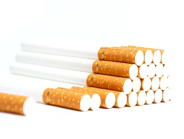Oranje Gekleurde Sigaretten Met Een Gouden Lint Een Witte Achtergrond — Stockfoto