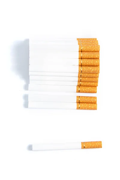 Orange Colored Cigarettes Gold Ribbon White Background Isolate — Stock Photo, Image