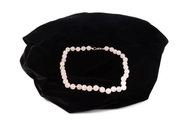 Natural Rose Quartz Beads Black Velvet White Background Isolate — Stock Photo, Image