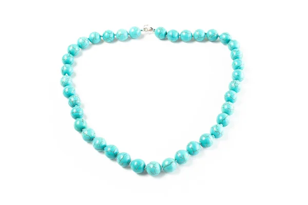 beads from natural Turquoise. On a white background isolate