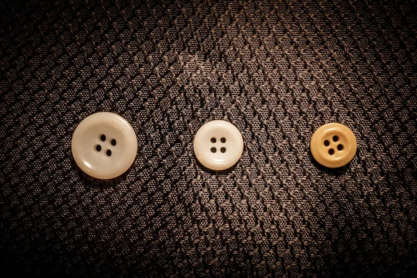 Abstratos botões de costura e contas no fundo preto — Fotografia de Stock