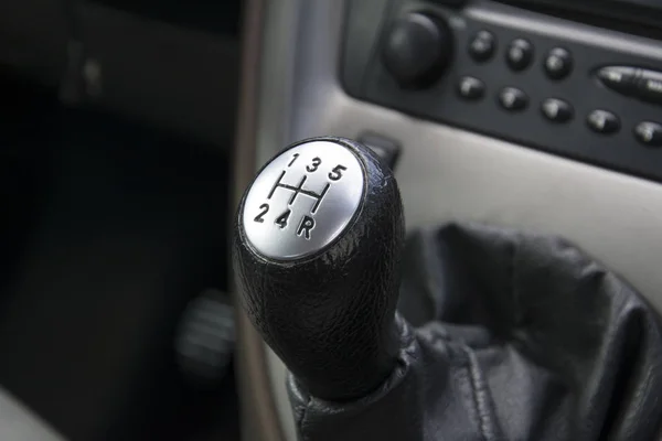 Manual Gearbox 5-speed shift knob, car interior. Royalty Free Stock Photos