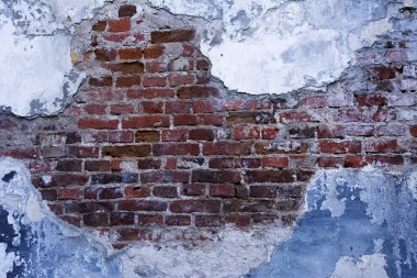 Eski tuğla duvarın eski bir parçası.