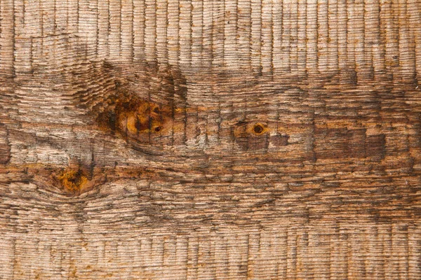 古い暗い木のテクスチャの背景、剥離繊維や亀裂と自然の未処理の木製の表面の構造。抽象的な背景のテクスチャを閉じる. — ストック写真