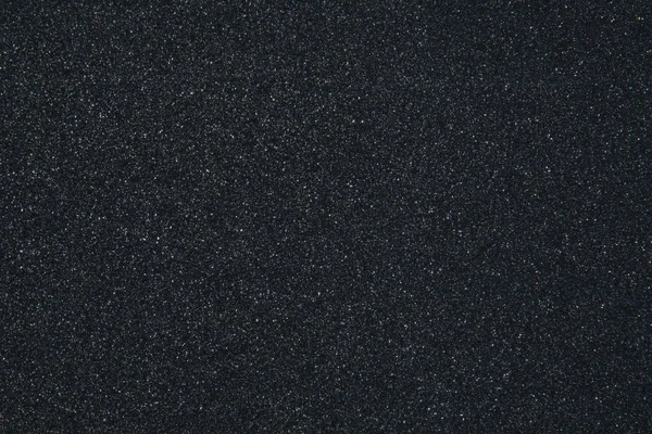 Glitter black background. Abstract bokeh texture of the starry sky. — Stock Photo, Image