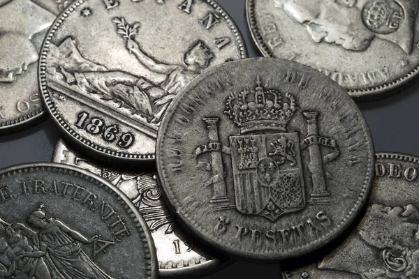 Old historically silver Coins from around the World in the Detail