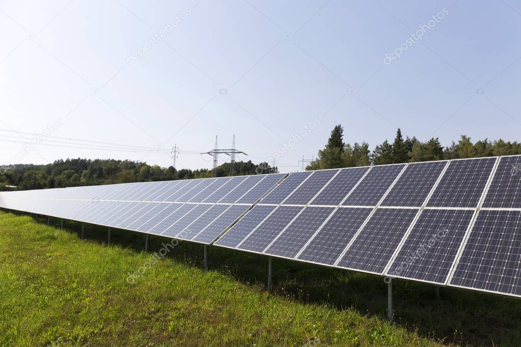 Solar Power Station on the summer Meadow 