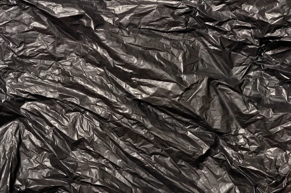 Black trash bag plastic texture — Stock Photo, Image