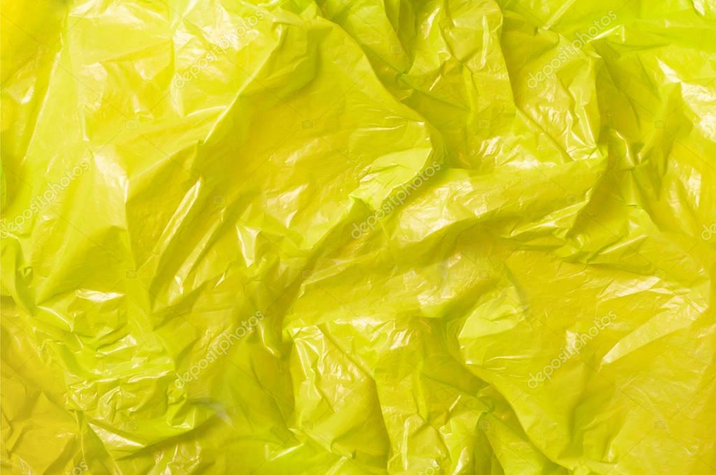 Yellow trash bag plastic texture — Stock Photo © chones 129244308