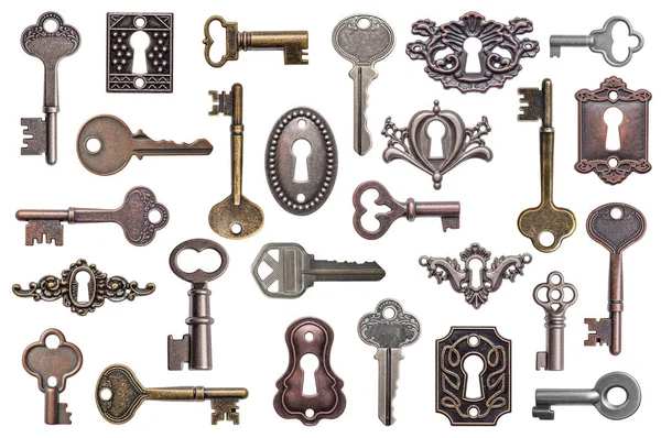 Set of old keys and keyholes isolated on white background — Stock Photo, Image