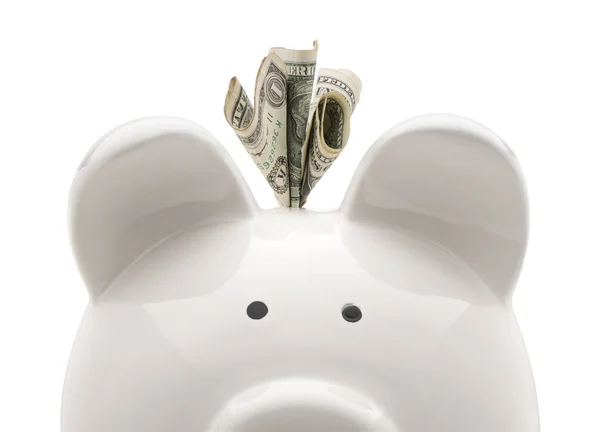 Close-up witte piggy bank en Amerikaanse dollars. Geïsoleerd op witte achterzijde — Stockfoto