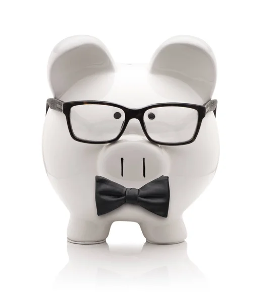 White piggy bank with glasses and tie bow isolated on white back — Stock Photo, Image