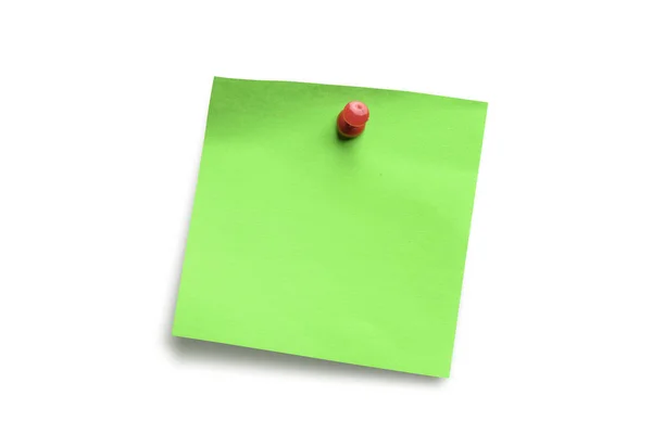 Green paper note pad attached with push pin isolated on white ba — Stock Photo, Image