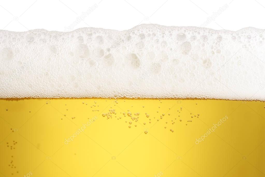 close up beer with foam and bubbles