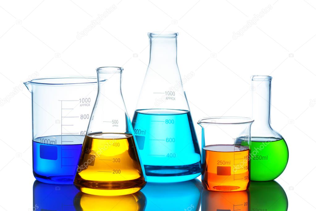 Laboratory glassware set with color liquid and reflection. Isolated on white background