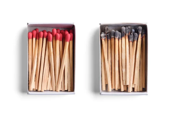 Top view of opened match boxes with burned matchsticks. Isolated — Stock Photo, Image