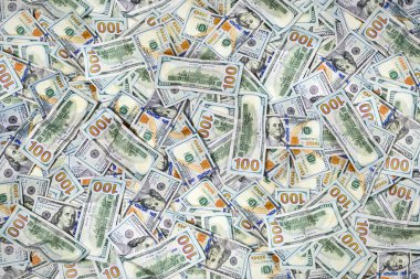100 dolarlık banknotları arka plan olarak yığın