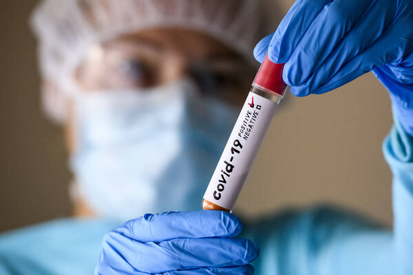 Woman Protective Suit Hold Test Tube Positive Result Infected Coronavirus Royalty Free Stock Photos