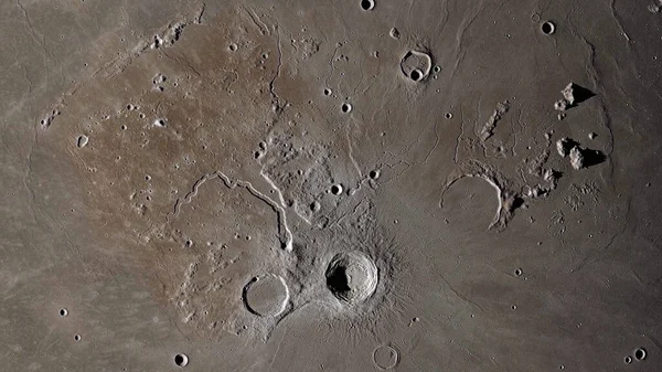 Moon surface close up. Craters and furrows