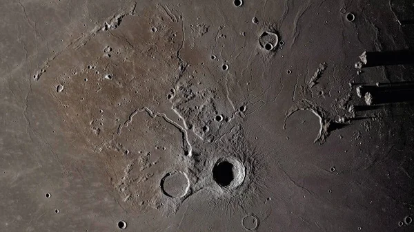 Moon surface close up. Craters and furrows