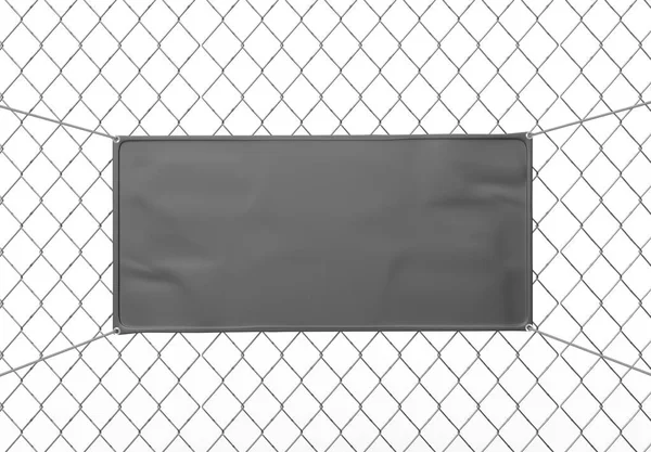 Blank Indoor outdoor Fabric Vinyl Banner hanging on the fence. 3d illustration.