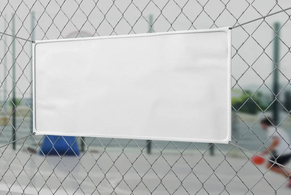 Blank Indoor outdoor Fabric Vinyl Banner hanging on the fence. 3d illustration.