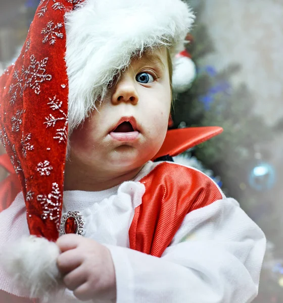 Cute baby dressed as Santa Claus — Stock Photo, Image