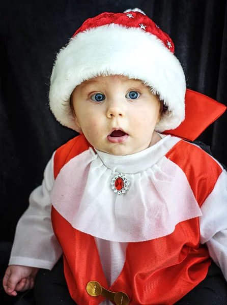 Cute baby dressed as Santa Claus — Stock Photo, Image