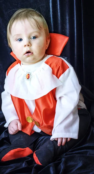 Beautiful baby boy 7 months in Dracula costume — Stock Photo, Image