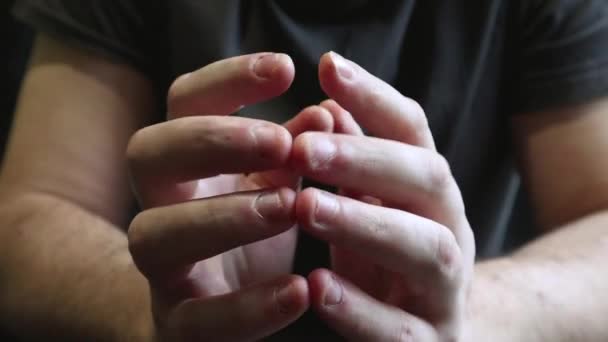 Close view of male hands with strongly bitten nails. Finger selection with alarm. Ugly bitten fingers, cuticles, wounds on the fingers. Bad habit. The concept of onychophagy and dermatophagy. — Stok video