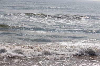 Plaj arka plan - güzel kum ve deniz ve güneş ışığı