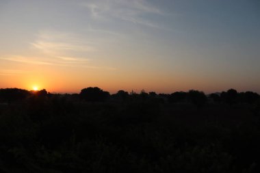 photography of silhouette in sunrise and sun