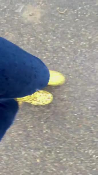 Young Woman Blue Jeans Walking Street Wearing Yellow Gum Boots — Stock Video