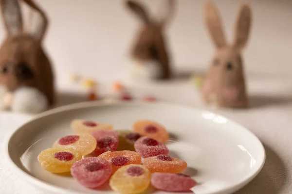 Three bunnies waiting for the candys.