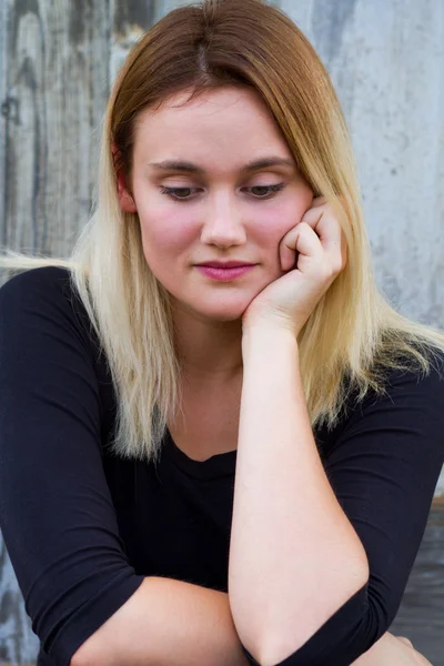 disappointed woman sitting