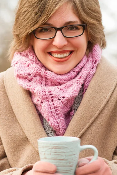 Woman drinking outdoor — Stock Photo, Image