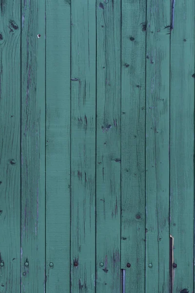 Alte Planken mit grüner Farbe — Stockfoto