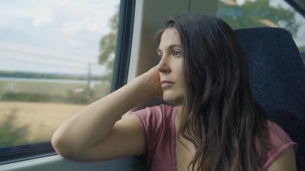 Attractive Woman Thought Looking Out Train Window Slow Motion — Stock Video