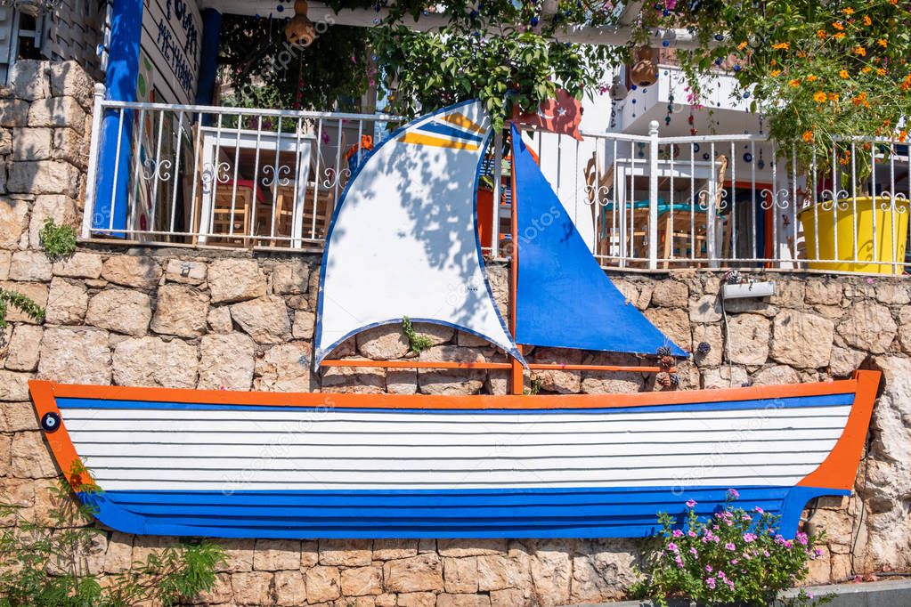 Sailboat on the street wall in Kas town. The lovely town of Kas in Turkey