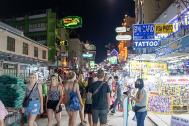 BANGKOK, THAILAND - FEBRUARY 2020: View of the Khao san road at night. Tourists enjoying Khao San Road, Khao San road is a famous place for sight-seeing and eating at night in Bangkok.