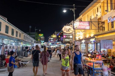 BANGKOK, THAILAND - FEBRUARY 2020: View of the Khao san road at night. Tourists enjoying Khao San Road, Khao San road is a famous place for sight-seeing and eating at night in Bangkok.
