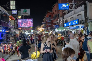 BANGKOK, THAILAND - FEBRUARY 2020: View of the Khao san road at night. Tourists enjoying Khao San Road, Khao San road is a famous place for sight-seeing and eating at night in Bangkok.