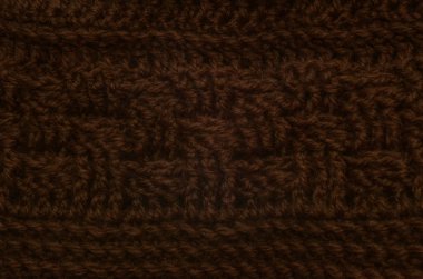 Kahverengi kare örgü bir fon için. Makro kış giysi dokusu.