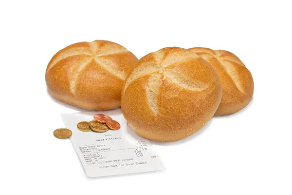 白地に請求書と硬貨付きの小麦パン — ストック写真