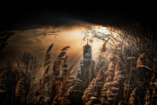 Church cloth in a gloomy setting mood and a dark sky — Stock Photo, Image
